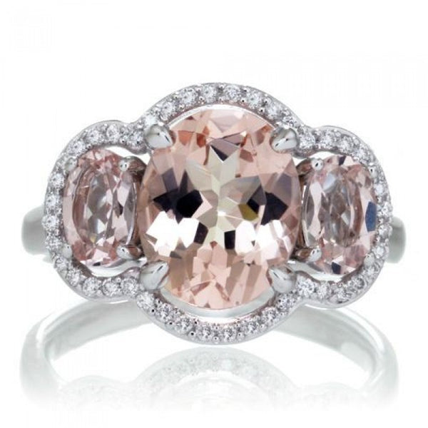 Morganite 10x8 oval diamond halo three stone anniversary ring