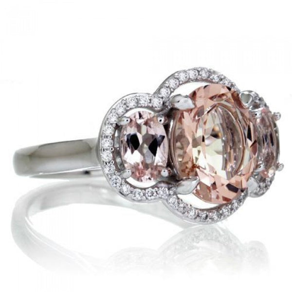 Morganite 10x8 oval diamond halo three stone anniversary ring