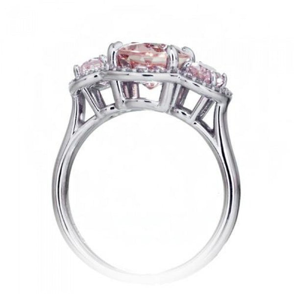 Morganite 10x8 oval diamond halo three stone anniversary ring